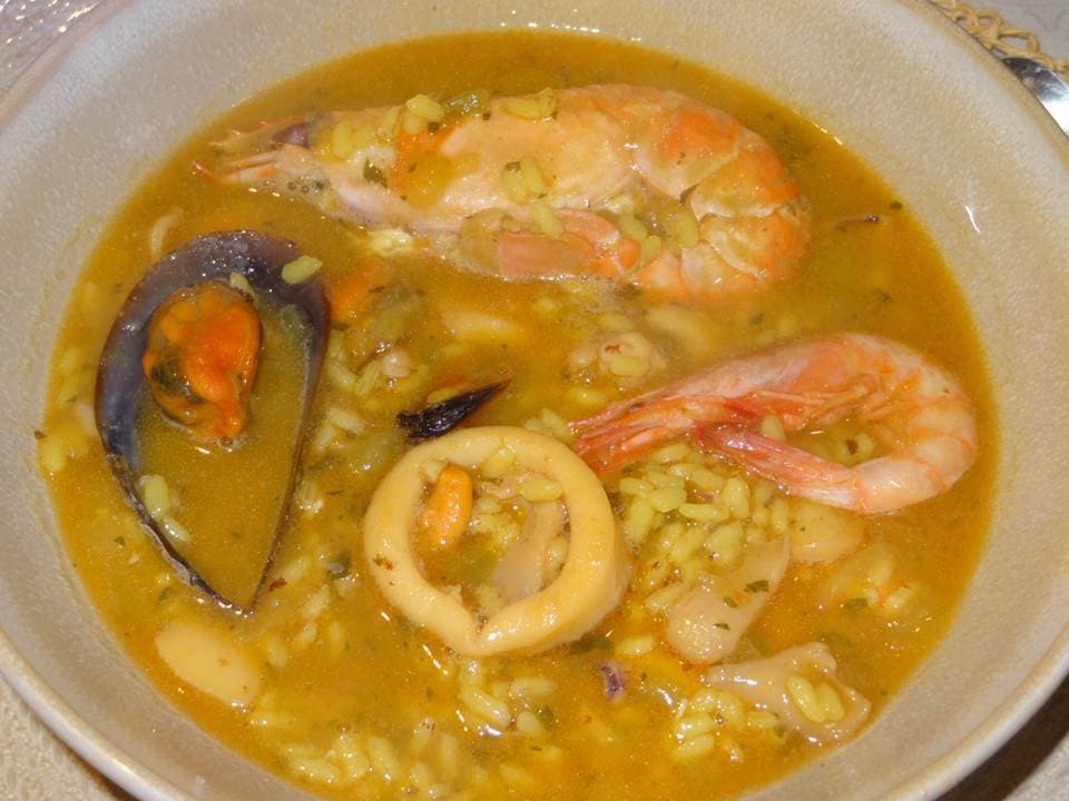 Arroz caldoso de mariscos al estilo “trébol”